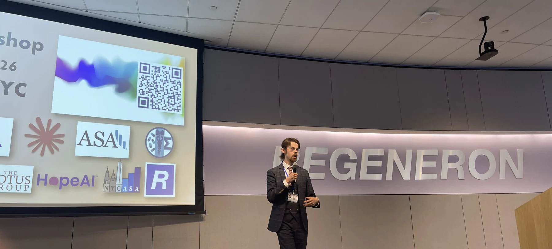 Reece Stone speaking at the AI Workshop NYC hosted at Regeneron